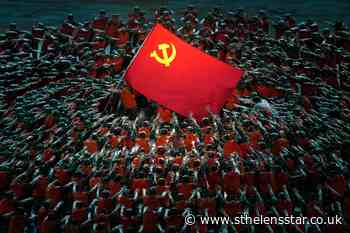 China's leader Xi Jinping hands out medals amid party celebrations - St Helens Star