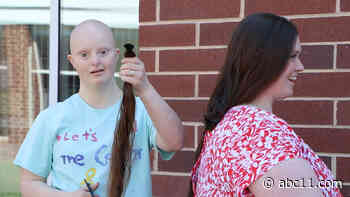 Teacher cuts hair in support of student battling cancer