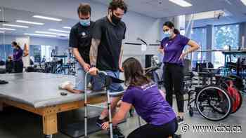 'You forget how tall you are': Paralyzed Humboldt Bronco able to stand during physio