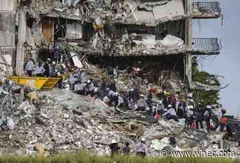 Four more bodies found in condo rubble; at least 16 dead