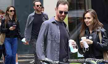 Lily Collins and her fiancé Charlie McDowell enjoy a low-key stroll