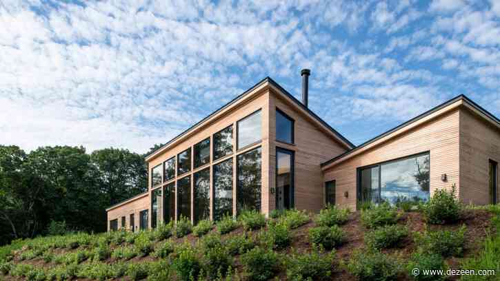GRT Architects perches house for a throuple above tidal marsh in Connecticut