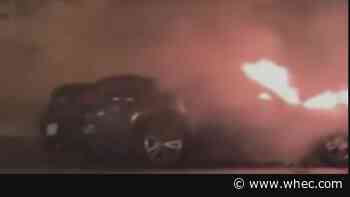 Driver pulled out of burning car after crashing into building in Rochester