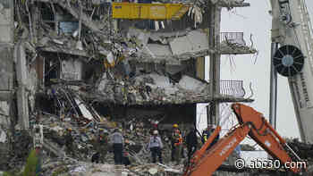 Work at collapsed Florida condo halted amid safety concerns; voice from rubble briefly heard
