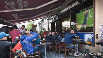 Fußballfans in Ulm: Nach dem Gewitter die kalte EM-Dusche - SWP