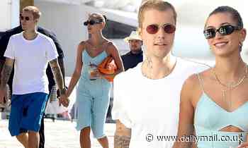 Justin Bieber lovingly holds hands with his stunning wife Hailey Bieber as they explore Mykonos