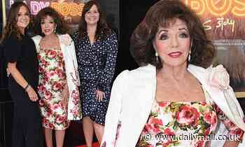 Dame Joan Collins, 88, looks elegant in a floral dress