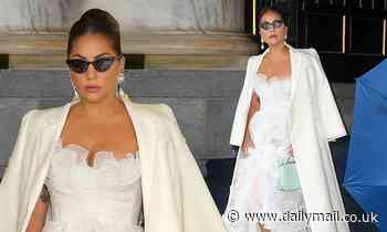 Lady Gaga is wonder in white as she dons exquisite tulle gown while continuing parade of chic looks