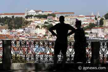 The Latest: Portugal sets curfews where coronavirus surging - The Associated Press