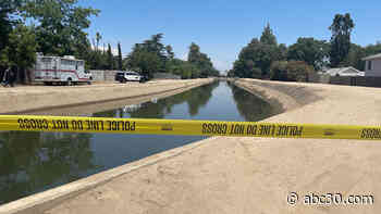 Police investigating after man found dead in central Fresno canal