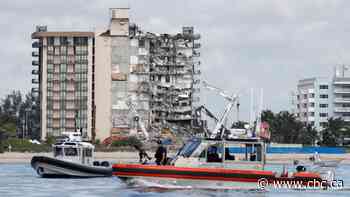 Rescue efforts resume in Florida condo collapse after search halted over safety concerns