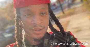 Winston Smith raised phone, not gun, say attorneys for woman in car