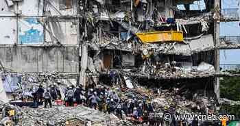 Condo collapse rescue mission restarts while hurricane warning looms. Today's update     - CNET