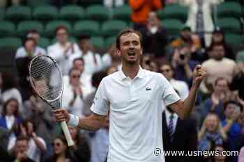 The Latest: Medvedev Rallies From 2 Sets Down at Wimbledon