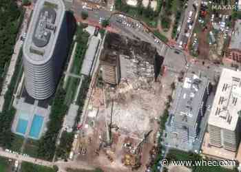 Demolition preparations begin at condo with storm looming