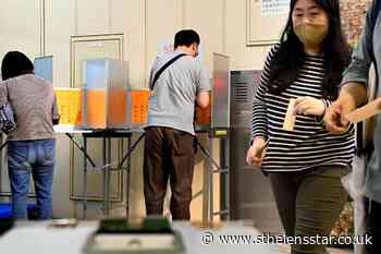 Tokyo voters elect assembly amid pandemic fears over Olympics - St Helens Star