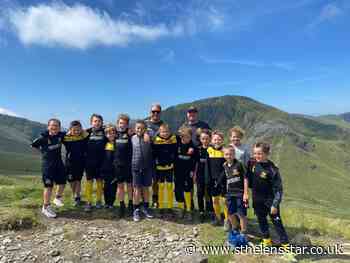 Earlestown Under 10s Celtics celebrate climbing Snowdon - St Helens Star