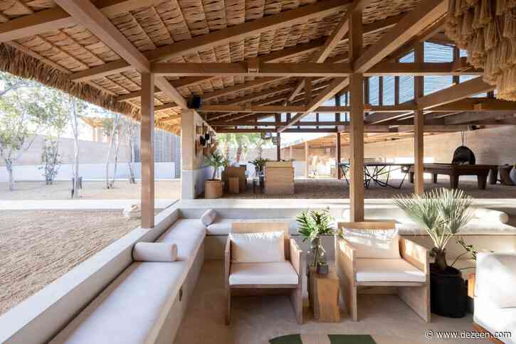 Estudio ALA designs El Perdido Hotel with rammed earth walls and thatched roofs