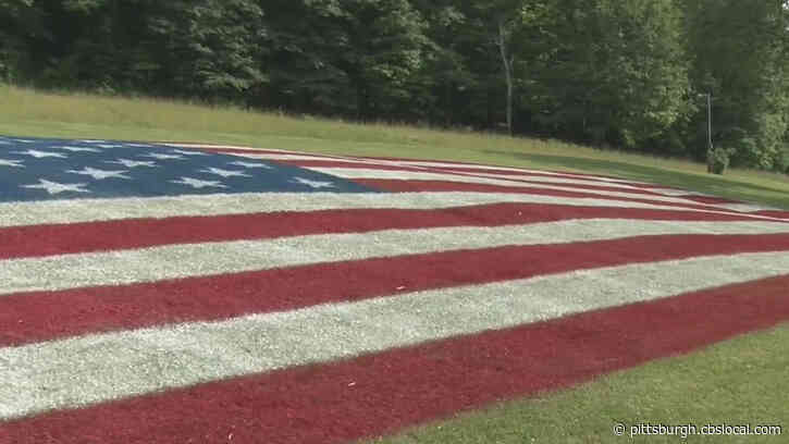 Massive American Flag Gets Painted On Grass In Washington Co. Park