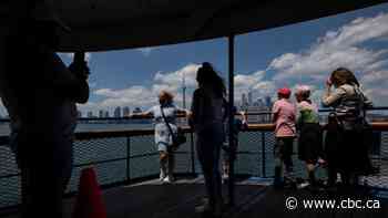 Blazing sun and humidity prompt Environment Canada to issue heat warning