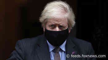 Johnson says restrictions to ease, UK must live with virus