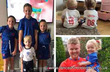 England football fans get ready of cheer on the Three Lions