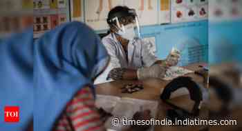 Coronavirus live updates: Ladakh completes first dose vaccination for all eligible beneficiaries - Times of India