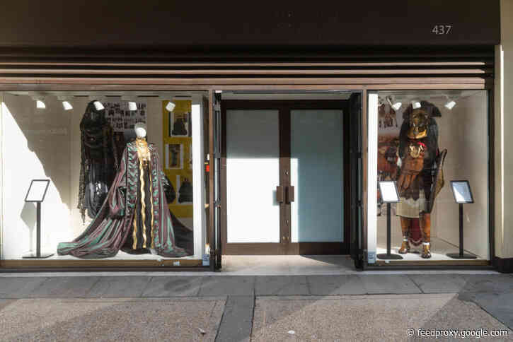 Theatre displays fill empty shop windows