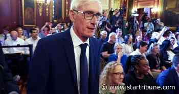 Evers signs GOP-written state budget with $2B tax cut