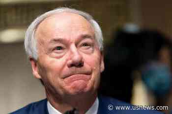 Hutchinson Takes Over Governors Group as Virus Resurges