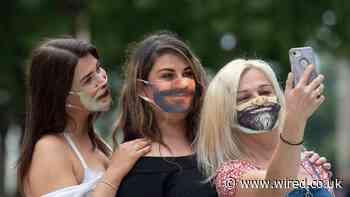 Yes, you should keep wearing a face mask