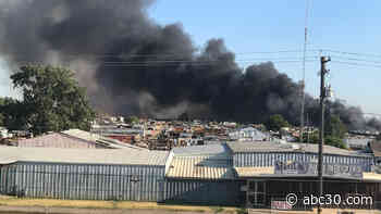 Crews battling flames that set multiple cars on fire in Merced County