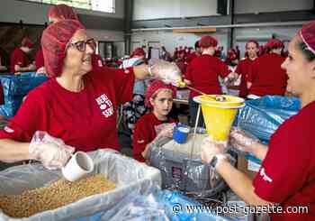 About 800 volunteers pack thousands of meals for the less fortunate as part of 'Serve Day'