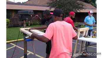 Local group builds nearly two dozen beds for children in need