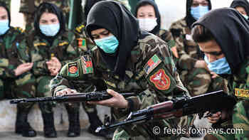 Afghan women carry guns in streets, protest Taliban as country struggles
