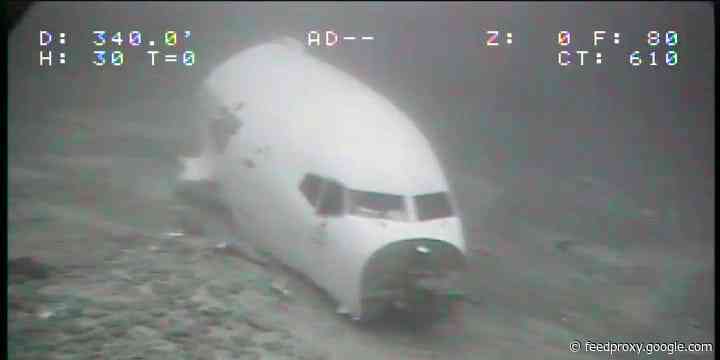 Eerie photos show the undersea wreck of a Boeing cargo plane that crashed off the coast of Hawaii