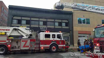 Firefighter falls through floor while responding to fire on Franklin Street