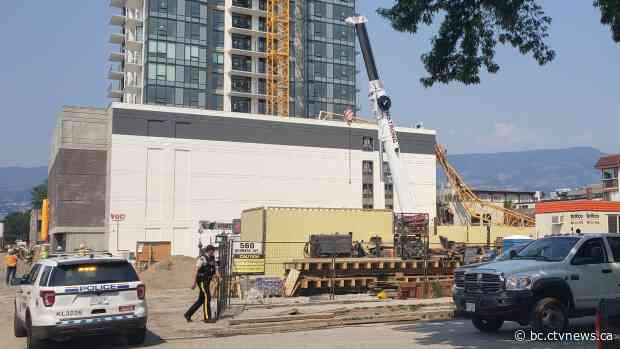 Crane collapses in Kelowna, B.C., leading to power outage, evacuation of downtown streets