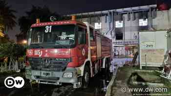 Iraq: Fire at coronavirus hospital kills dozens - DW (English)