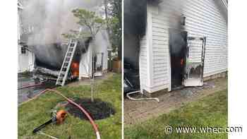 Rochester firefighter hurt fighting garage fire