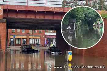 UK Weather: pictures show Raynes Park after flash flooding