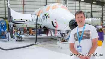 Melbourne man thought he was upgrading to first class. Next thing he knew he won a ticket on Virgin's Galactic space trip