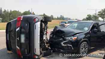 Saskatoon firefighters help driver crawl out of sunroof after rollover