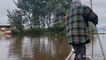 'It's overwhelming': Yukoners struggle to save homes from flood water