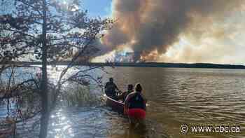 'Our hearts were pounding': Sask. canoeists helicoptered out due to forest fire - CBC.ca