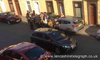 Blackburn: Driver flees after ramming into parked vehicles