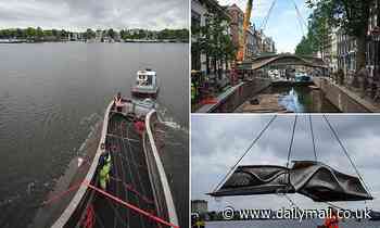 World's first 3D-printed steel footbridge is unveiled in Amsterdam's Red Light District