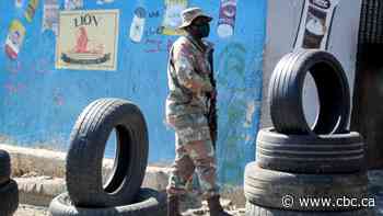 South Africa's army starts large deployment to restore order