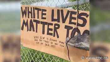 Leaders call for action after 'white lives matter too' sign hung from bridge near First Nation in Sask.