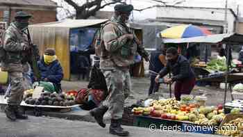 South Africa deploys 25,000 troops to end week of rioting